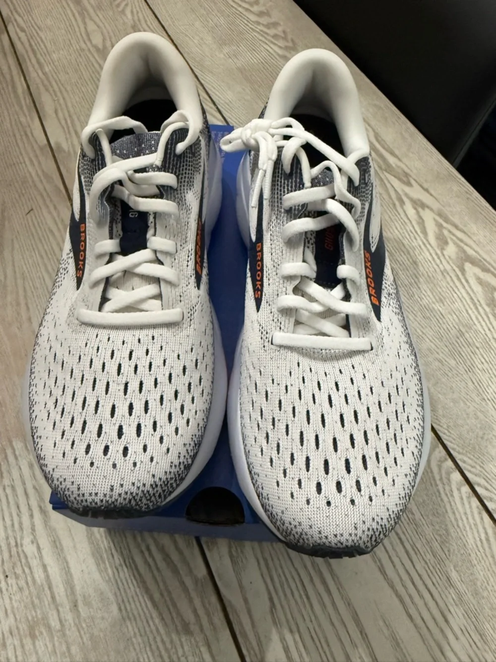 Brooks White and Navy Running Shoes with Orange Logo Accents